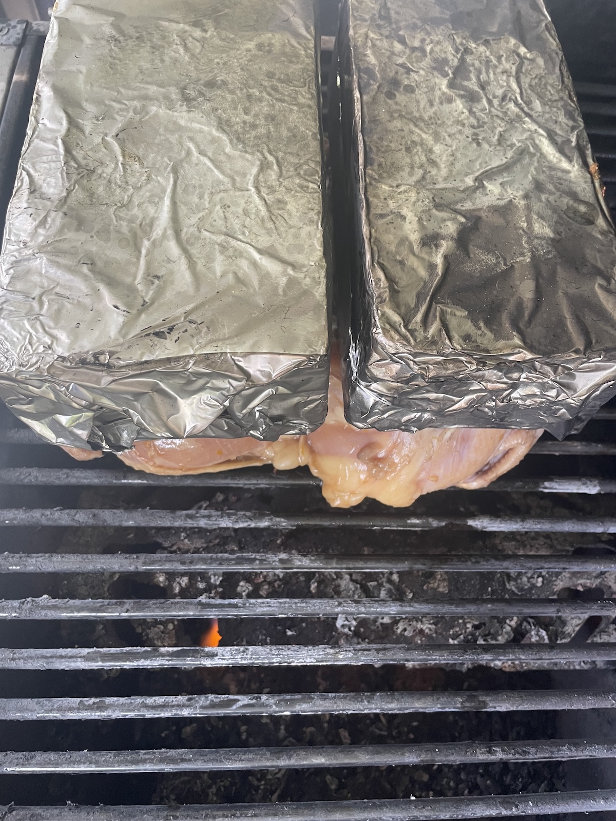 chicken under bricks