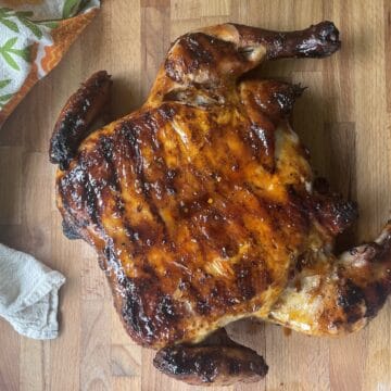 Grilled Asian Chili Crisp Chicken Under a Brick