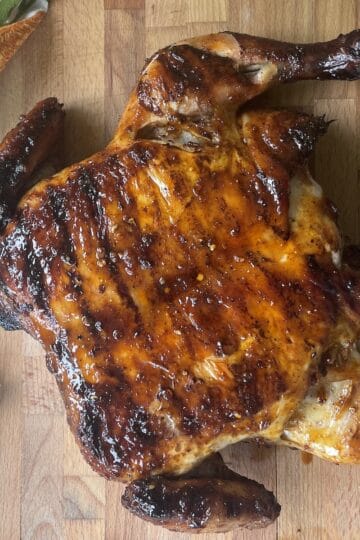 Grilled Asian Chili Crisp Chicken Under a Brick