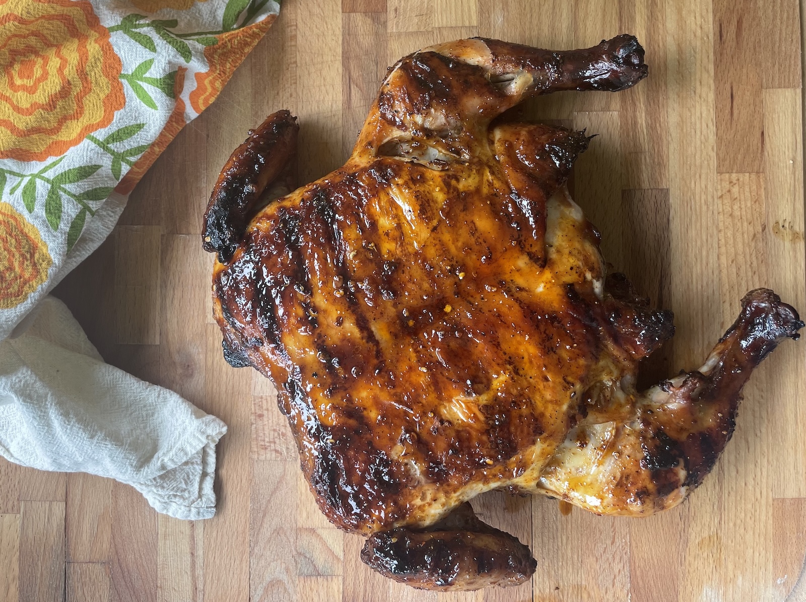 Grilled Asian Chili Crisp Chicken Under a Brick