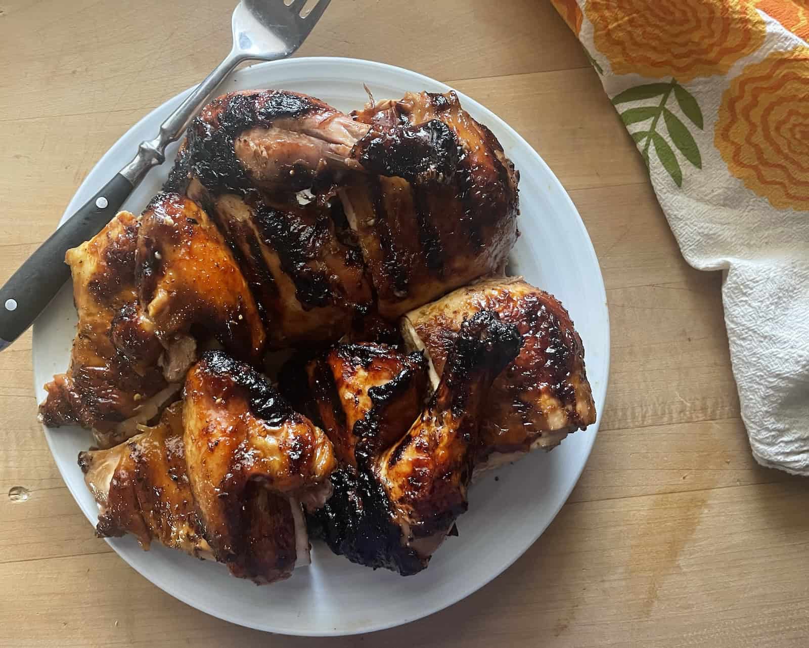 Grilled Asian Chili Crisp Chicken Under a Brick