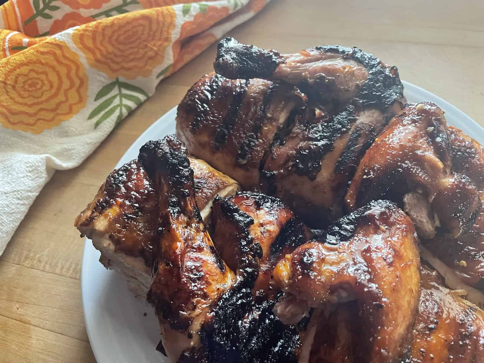 Grilled Asian Chili Crisp Chicken Under a Brick