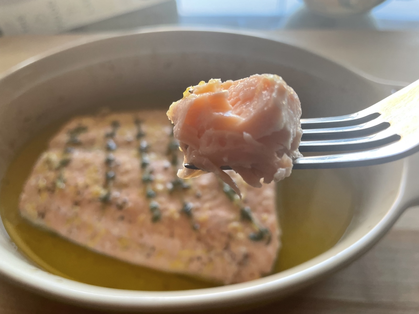 Lemon and Olive Oil Poached Salmon on a fork