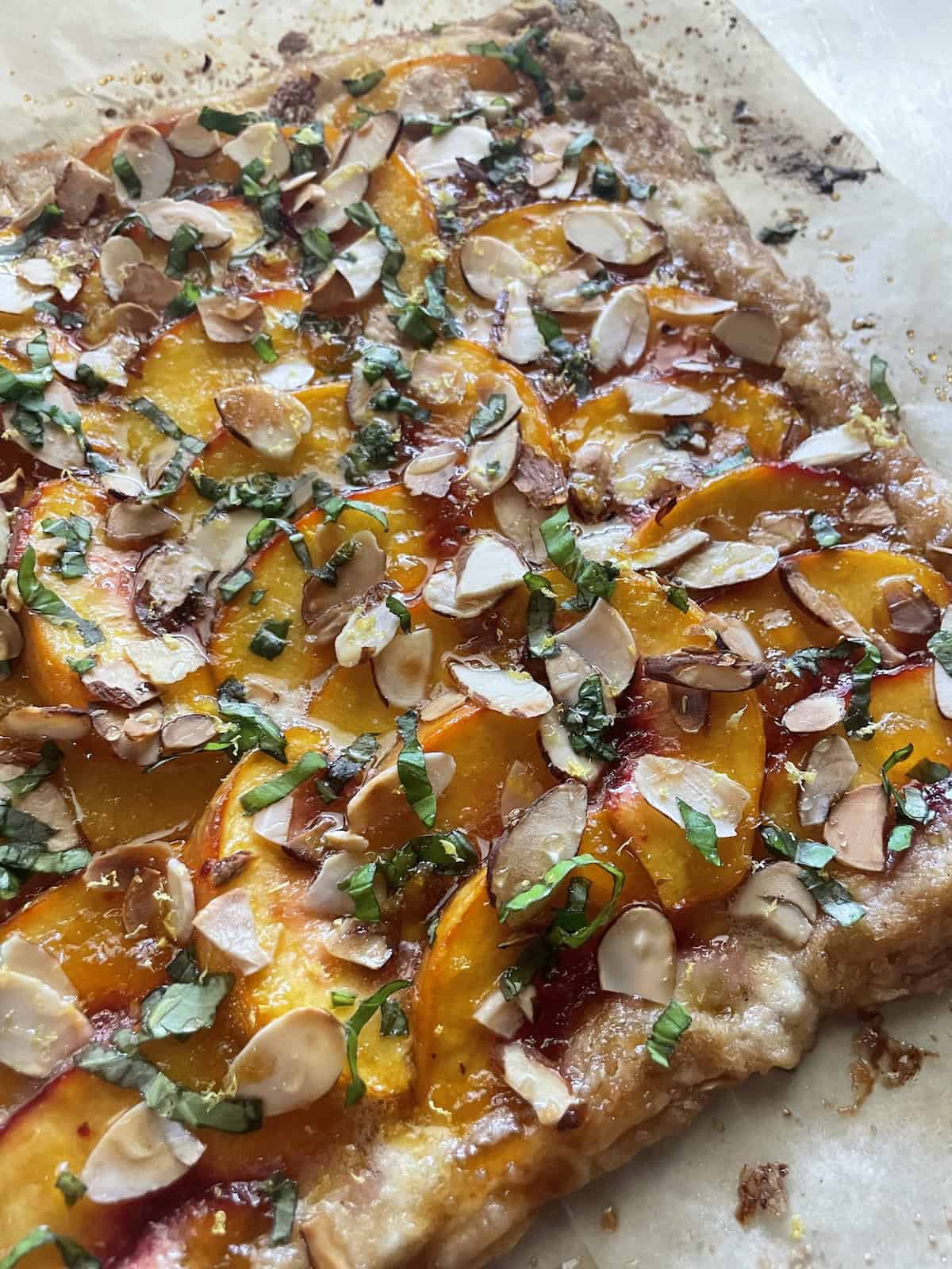 topped with honey, lemon zest and basil