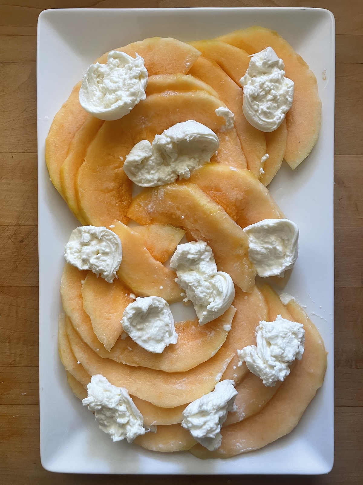 arrange burrata over top