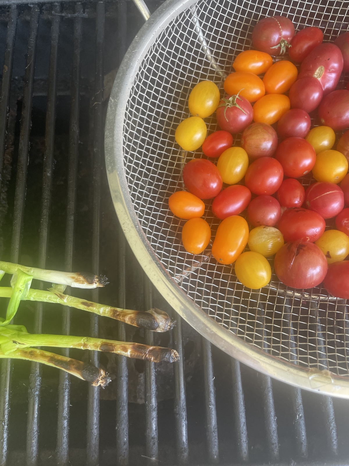 add tomatoes and scallions to grill